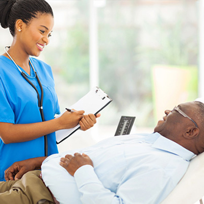 nurse tending to a patient