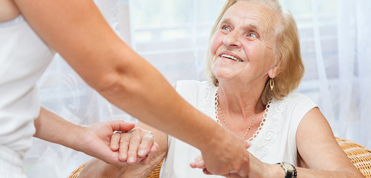 nurse talking to a resident