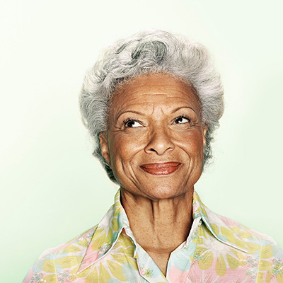 woman smiling and looking up