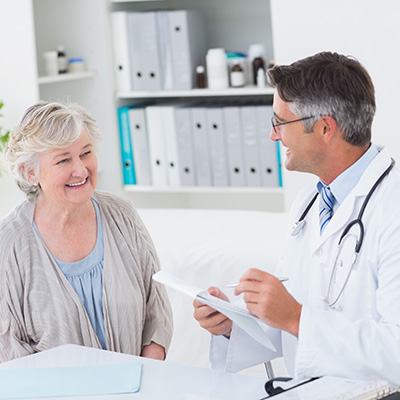 doctor speaking with a patient