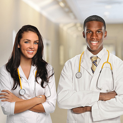 Two nurses smiling together.