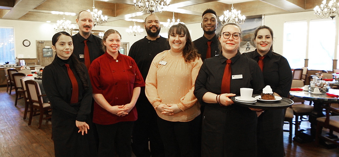 Dining staff smiling