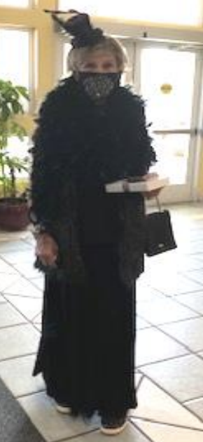 A resident dressed as a witch.