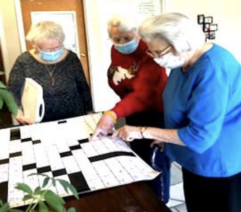 Residents doing a crossword puzzle