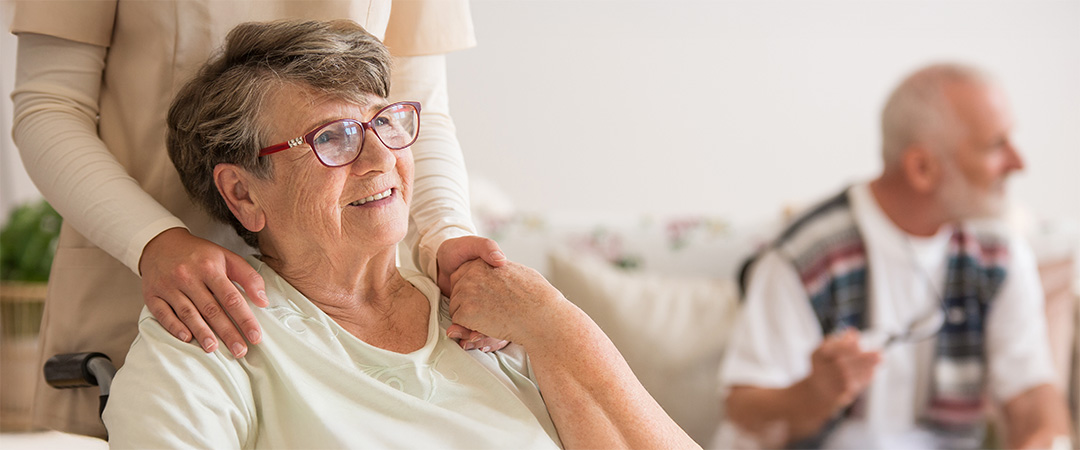 a nurse and an elderly lady working on heart health