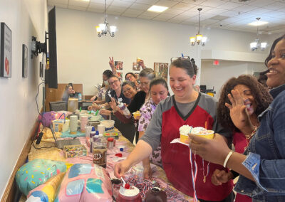 A group of employees at an event at Lowry Hills