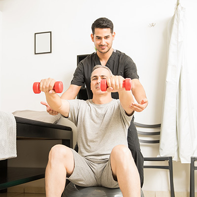 Two men doing exercises together.