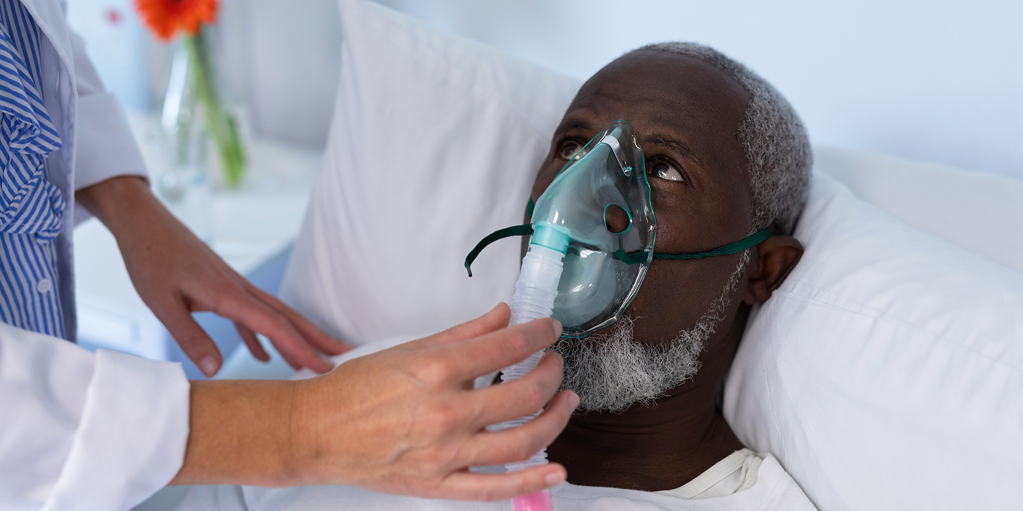 A man receiving a breathing treatment in a nursing home.