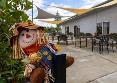 A scarecrow out in the courtyard of Oak Ridge