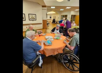 Group of residents dyeing easter eggs