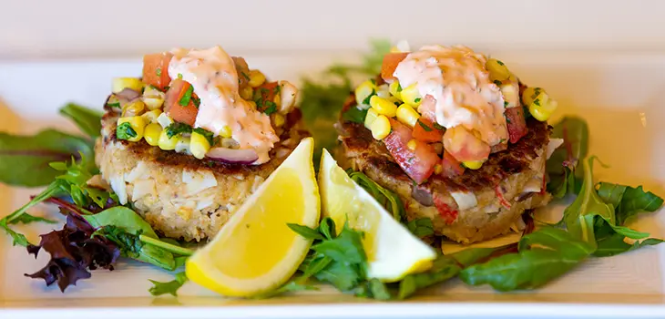 Crab cakes on a bed of lettuce