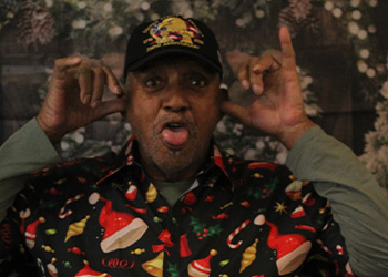 two women petting a pony