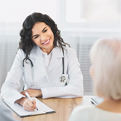 A doctor talking with a patient