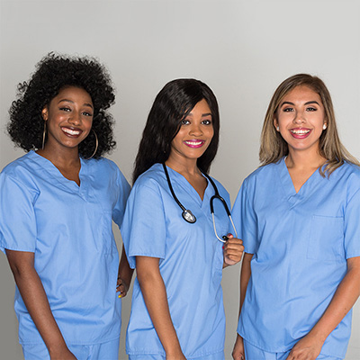 Three nurses smiling