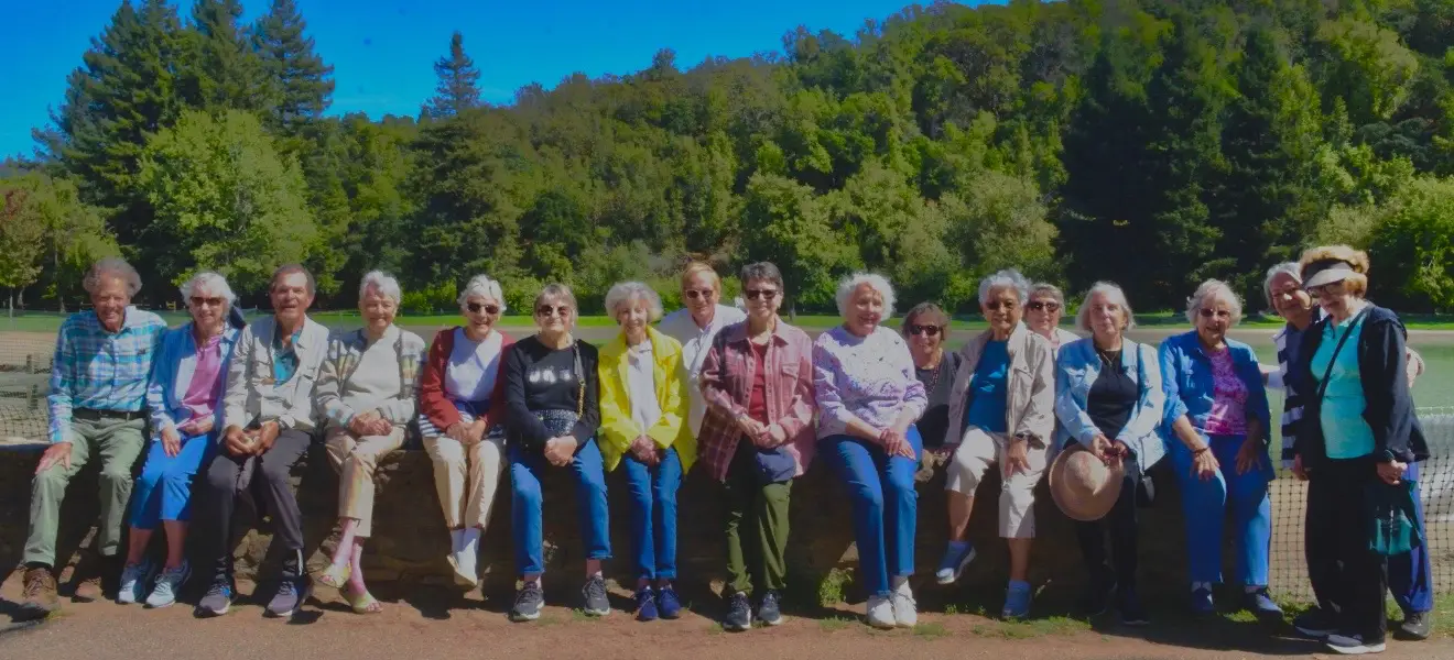 Group photo of several residents out on a hike together
