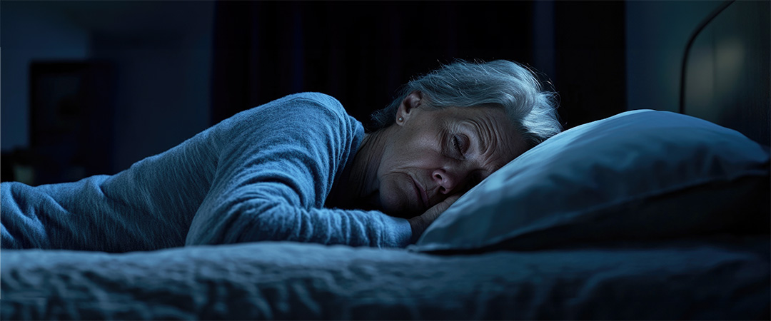 A senior woman sleeping.