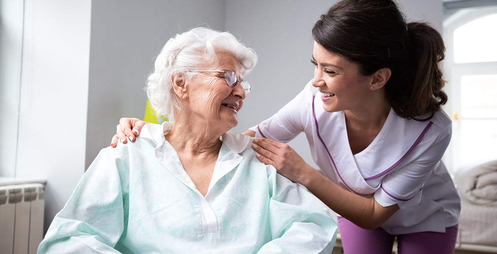 Nurse Helping Elderly Women