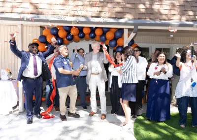 Staff members celebrating the grand opening of Quiescence 2