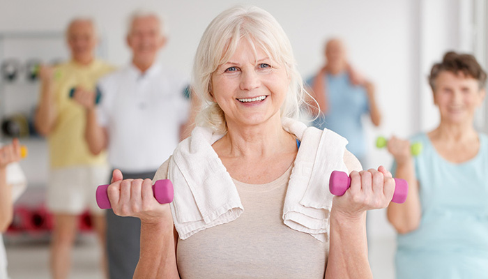 senior woman in a rehab gym