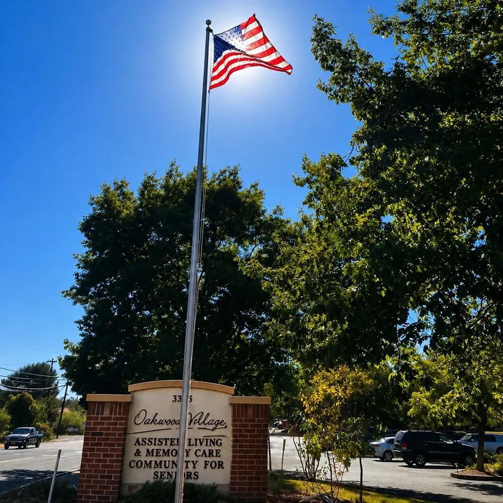 An American flag and the Oakwood sign
