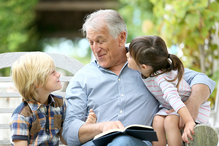 Senior gentleman with young grandkids