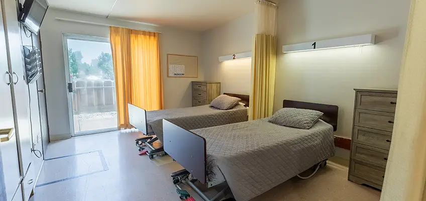 A semi-private resident room at Los Banos