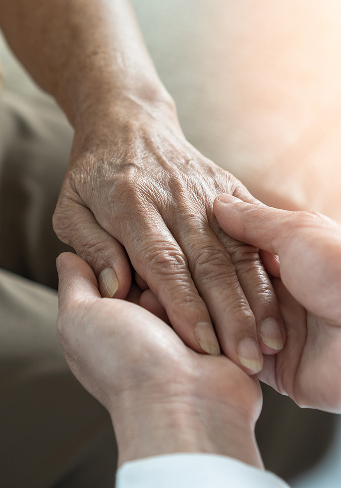 yolo-700x1000-4 Hands holding an older pair of hands