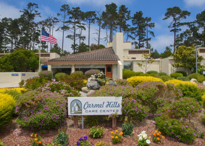 Flowers and plants in front of the entrance to Carmel Hills