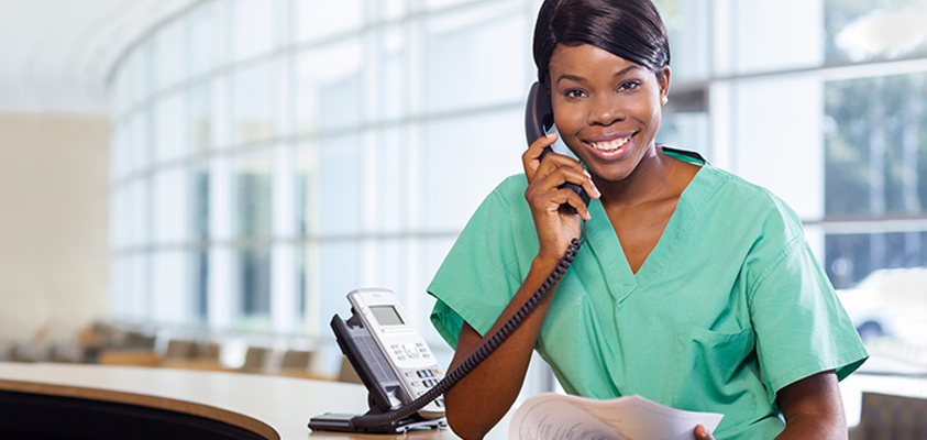 Nurse answering a telelphone