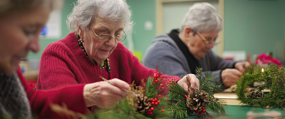 skilled nursing residents working on a wreath