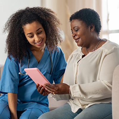 African American Nurse with an African American elderly woman